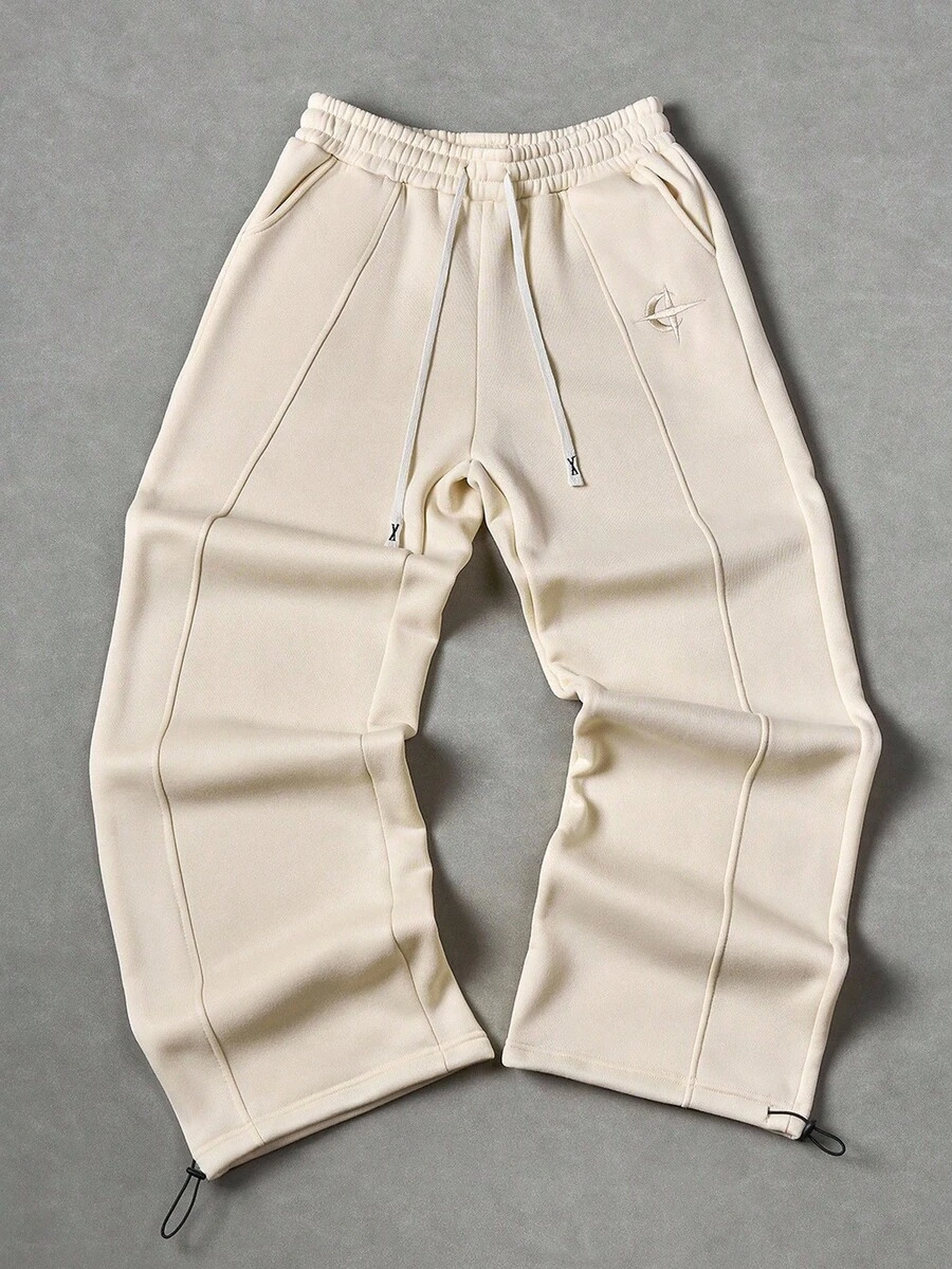 Manfinity Roghcode 年轻男士休闲街头风格刺绣徽章运动裤 - 杏色 - 查看 1