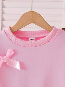SHEIN Playful Pals 2pcs/Set Young Girls Fashion Pink Bow Round Neck Long Sleeve Sweatshirt And Elastic Waist Jogger Pants, Casual Sporty Outfit Suitable For Spring And Autumn Girls Jogging Set Girls Sweatsuit Set Girls Comfy Set Toddler Girl Sweatsuit Girls Bow Set Fall Winter