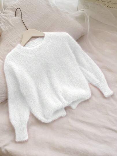 Genkimix Kids 少女毛衣，秋冬必备，简约时尚。适合圣诞节、新年、春节等节日，让小女孩更显可爱。采用优质纱线材质，柔软舒适，亲肤；精细针织工艺，不易起球，耐穿耐洗。宽松舒适的圆领设计，易于穿脱；袖口和下摆合身。