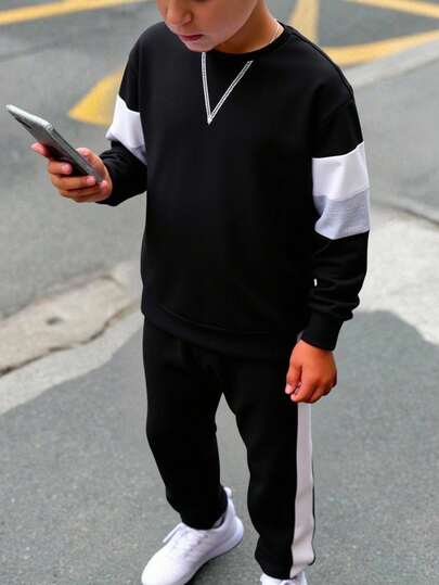 SHEIN 2 件儿童青少年男孩休闲百搭撞色块圆领套头连帽衫和纯色抽绳裤针织 2 件套，适合学校、花园、海滩、生日、春季、夏季、秋季、冬季