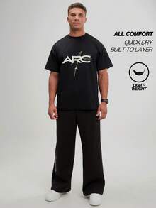 ARC Men's Unrestricted Motion Top | Quick-Dry 4-Way Stretch Moisture Wicking | Confident Lifestyle Fit - Black - View 5