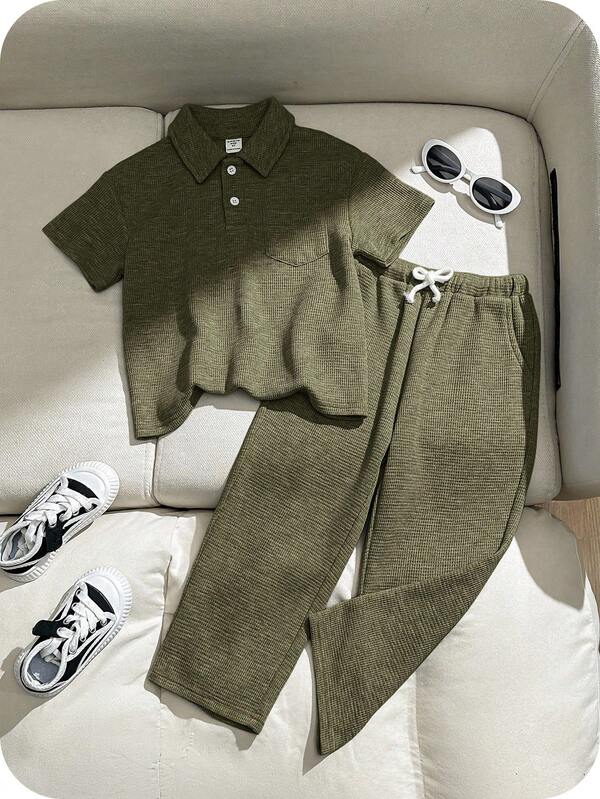 SHEIN 2pcs Young Boy Loose Casual Turndown Collar Short Sleeve Polo Shirt And Pants Set