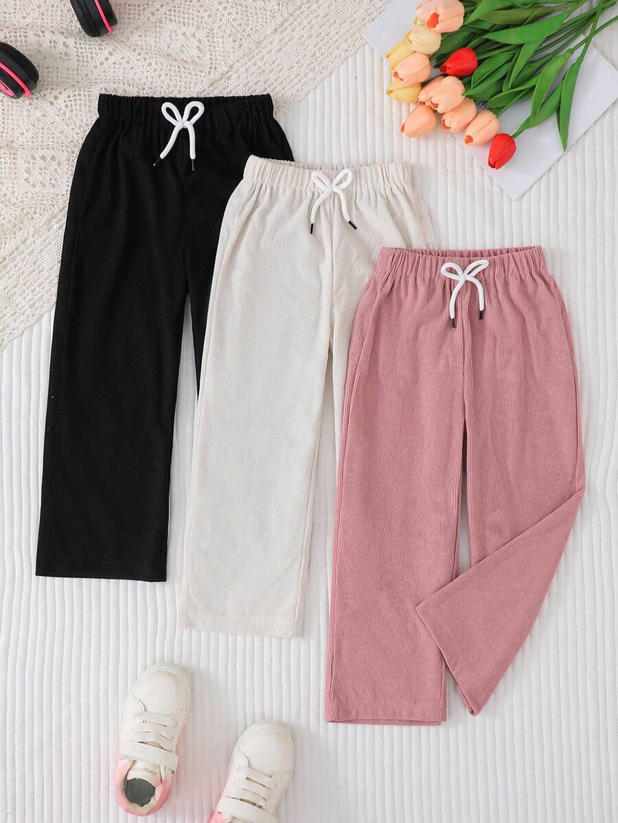 SHEIN 三件套女童休闲舒适套装,包括带蝴蝶结松紧腰带的裤子,纯色灯芯绒面料,直筒裤型,适合春秋季穿着。 - 彩色 - 查看 1