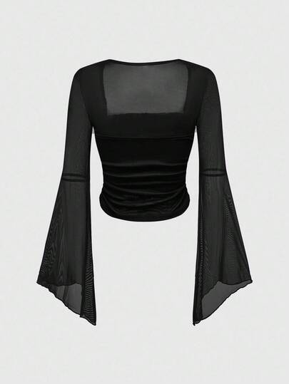 Chemise longue transparente minimaliste à manches longues en maille pour femmes