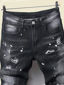 SHEIN Jeans strappati e macchiati di vernice per ragazzo adolescente