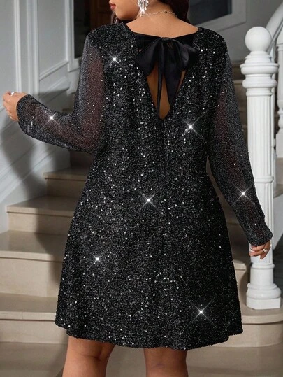 Reflora Curvy Plus Size Damska Czarna Wysokiej Jakości Elastyczna Błyszcząca Cekinowa Tkanina Okrągły Dekolt A-Line Odkryte Plecy Kokarda Węzeł Sukienka, Odpowiednia Na Wiele Okazje, 2025 Nowość, Jesienne Ubrania Dla Kobiet, Jesienne Ubrania, Zimowe Ubrania Dla Kobiet, Zimowa Sukienka Damska, Kostium na Halloween Dla Kobiet, Boże Narodzenie Odzież Damska, Sukienka Świąteczna, Odzież na Dzień Narodowy Arabii Saudyjskiej, Sukienka na Dzień Narodowy Arabii Saudyjskiej, Sukienka Noworoczna, Noworoczne Ubrania Damskie, Noworoczny Wygląd, Sukienki Imprezowe, Eleganckie Sukienki Na Imprezę, Curvy Sukienki Imprezowe, Wyjście, Sukienka na Ukończenie Szkoły Dla Kobiet, Sukienka na Ukończenie Szkoły, Sukienka na Gość Ukończenia Szkoły, Elegancka Długa Sukienka na Ukończenie Szkoły, Suknia Balowa, Sukienki Studniówkowe Dla Kobiet, Formalne Suknie Balowe Dla Kobiet, Suknia Studniówkowa Plus Size, Błyszcząca Sukienka, Sukienka z Cekinami, Wyjście Wieczorne, Stroje na Randkę Damskie, Sukienki dla Matki Panny