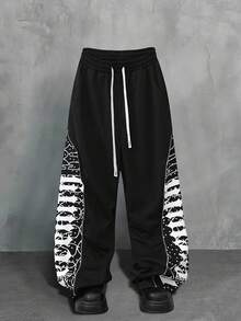 ROMWE MEN Street Life Pantalones de chándal rectos con cremallera y estampado de retazos, estilo casual de calle, unisex, para otoño/invierno - Negro - Ver 1
