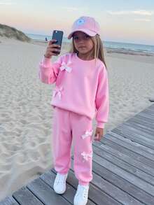 SHEIN Playful Pals 2pcs/Set Young Girls Fashion Pink Bow Round Neck Long Sleeve Sweatshirt And Elastic Waist Jogger Pants, Casual Sporty Outfit Suitable For Spring And Autumn Girls Jogging Set Girls Sweatsuit Set Girls Comfy Set Toddler Girl Sweatsuit Girls Bow Set Fall Winter