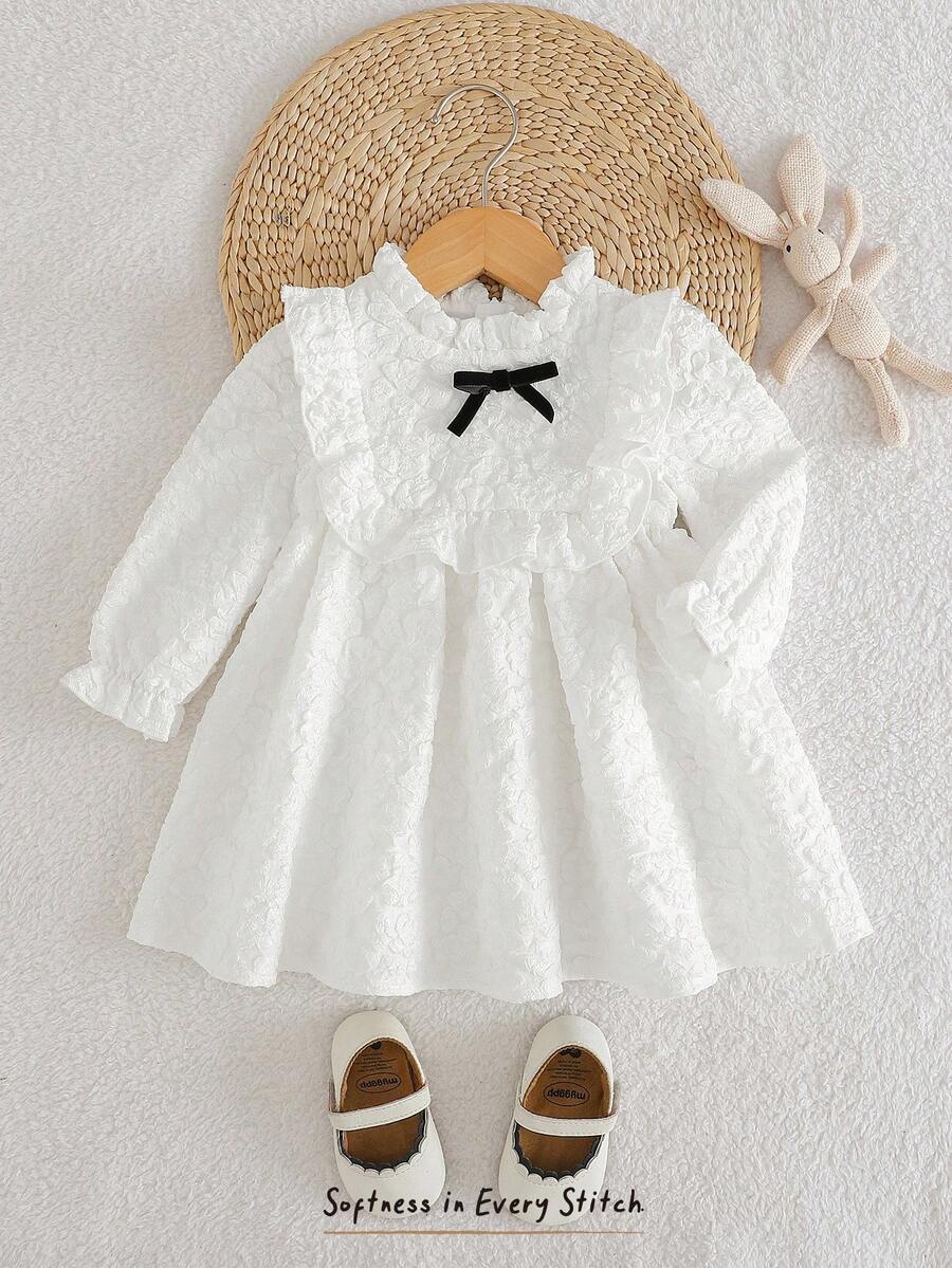 Cozy Pixies Baby Girl White Textured Soft Fabric Solid Color Ruffle Collar Long Sleeve Cinched Waist Cute Princess Style Party Casual Elegant Sweet Jacquard Bow Decor Fashion Long Sleeve Dress, Suitable For Autumn/Winter - Beige - View 1