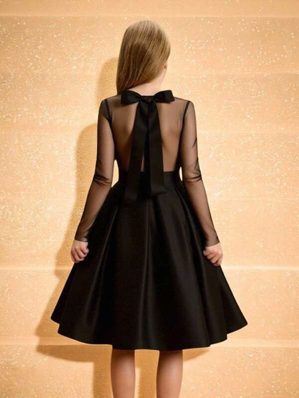 Abito elegante a maniche lunghe per ragazze pre-adolescenti, in nero con paillettes e inserti in rete