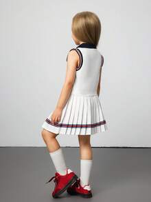 Hanevo مجموعة فتاة من ملابس علوية كنزة بياقة على شكل V مزر وتنورة قصيرة منسدلة 2 قطعة/طقم ، مناسب للمدرسة والخروجات ، لجميع المناسبات والاستخدام اليومي ، مناسب للصيف