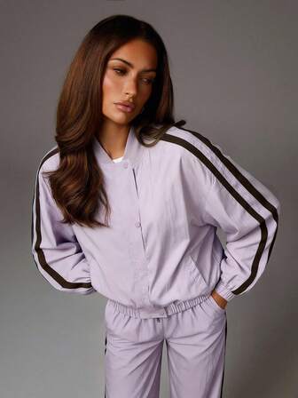 Athîral Kontrastrandig damjacka med lång ärm