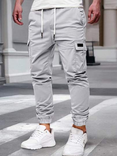 Manfinity Homme Pantalon cargo casual plus mature pour hommes, convenant pour le port casual quotidien, les sorties de week-end, les activités de plein air, les voyages, les aventures et les rassemblements sociaux entre amis. Ce pantalon est un article polyvalent indispensable dans la garde-robe d'un homme, en faisant un excellent cadeau pour un petit ami ou un mari. Automne