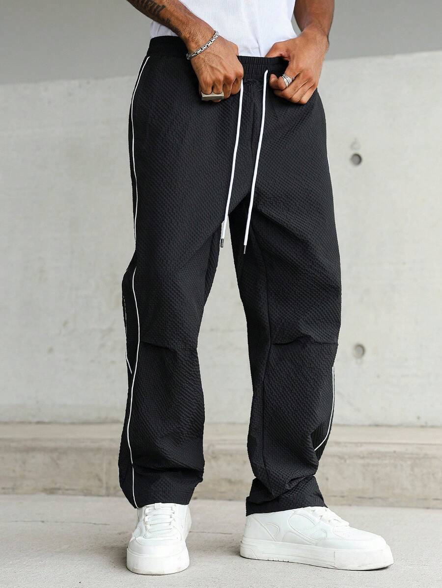 Manfinity Hypemode 男士直筒裤，侧边抽绳设计，休闲系列新款，百搭百搭，适合所有季节，是送给男友/老公的绝佳礼物。男士休闲裤，宽松直筒裤，秋季款。 - 黑色 - 查看 1