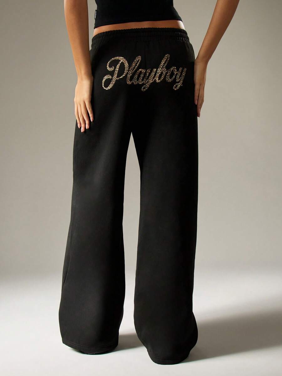 Missguided x Playboy Pantaloni joggers luxoși din catifea, cu logo, talie înaltă, imprimeu cu sclipici și logo, stil casual de iarnă - Gri deschis - Vizualizare 1