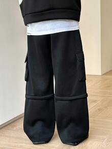 SHEIN Pantalon de survêtement ample à poches obliques de style collège pour garçon préadolescent, en couleur unie tissée, convient pour le printemps, l'été, l'automne et l'hiver - Noir - Voir 4