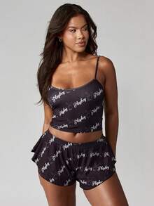Missguided x Playboy Conjunto de pijama de top tipo camiseta y shorts con estampado de logo para Navidad - Negro - Ver 3