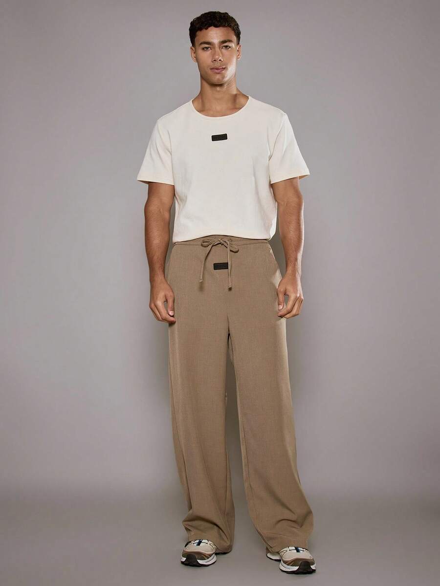 Musero Pantalón de estilo sastre inteligente para hombres con cintura con cordón y parche 3D central, ropa de otoño/primavera-verano - Gris - Ver 1