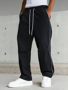 Manfinity Hypemode 男士直筒裤，侧边抽绳设计，休闲系列新款，百搭百搭，适合所有季节，是送给男友/老公的绝佳礼物。男士休闲裤，宽松直筒裤，秋季款。 - 黑色 - 查看 3