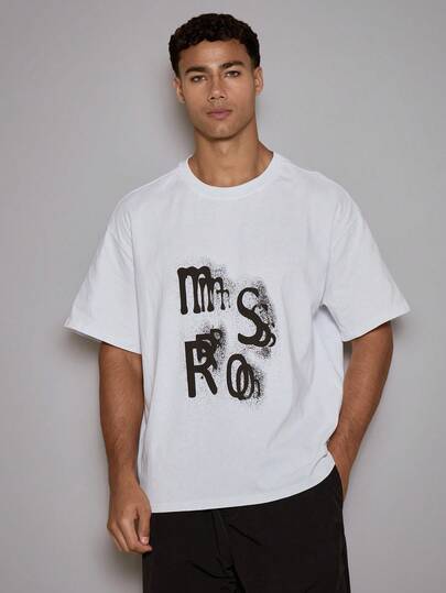 Musero Camiseta gráfica central con ajuste holgado y cuadrado para hombre, ropa de verano, ropa de otoño/invierno