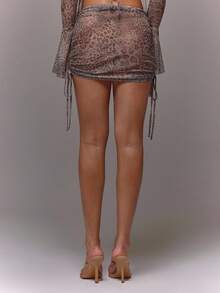 MUSERA Minifalda de malla transparente con pliegues y lazos laterales con estampado total para verano, linda, sexy, divertida, festival, chica cool, fiesta, invierno, otoño, Navidad