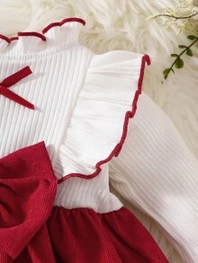 新生女宝宝白色长袖蕾丝领拼布粉色蝴蝶结连衣裙秋冬新款优雅复古可爱面料舒适