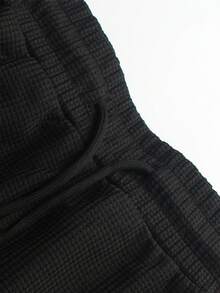 Manfinity Homme Conjunto casual de talla grande para hombre compuesto por una camisa tipo polo de manga larga con cremallera y un pantalón con cordón en la cintura, traje casual de dos piezas para hombre, ropa de viaje, ropa negra casual, ropa casual de talla grande, ropa de otoño