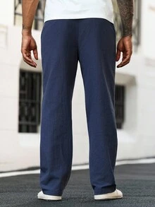Manfinity Homme Pantalon décontracté ample en coton de couleur unie avec cordon de serrage à la taille et poches en biais, automne - Bleu marine - Voir 2