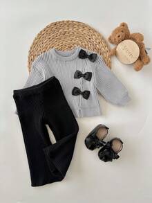SHEIN Conjunto de 2 piezas de suéter de punto con lazo marrón lindo y pantalones acampanados para bebé niña, otoño/invierno