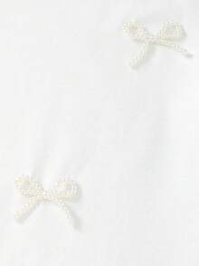 Sparklyn Tween-Mädchen Einfarbiges, lässiges T-Shirt mit Rundhalsausschnitt, langen Ärmeln und Schleifendekor aus Kunstperlen