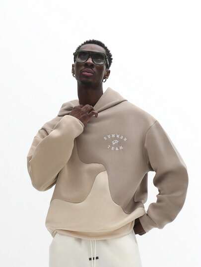 SUMWON Paneled Hoodie With Curved Wave Panels Block Pattern Fashion Streetwear Trendsetter Urban Style Fall Winter Casual Pullover