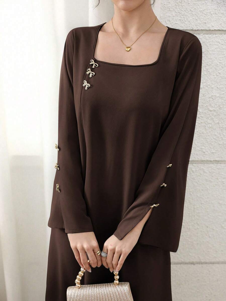 Yasmyna Locker geschnittenes Damen Kleid im arabischen Stil mit handgefertigter Blumentextur und Schleifen-Dekor