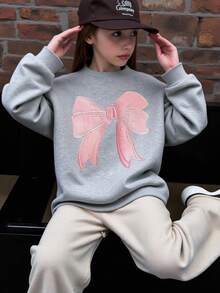 年轻女孩休闲圆领蝴蝶结设计运动衫，适合情人节、秋冬季