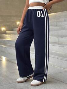 SHEIN Spodnie dresowe dla dziewcząt z nadrukiem "Wracamy do szkoły" w kontrastowym kolorze, z elastyczną talią i sznurkiem ściągającym, z nadrukiem numerycznym, luźne, proste nogawki, uniwersalne i modne - Granatowy - Zobacz 6