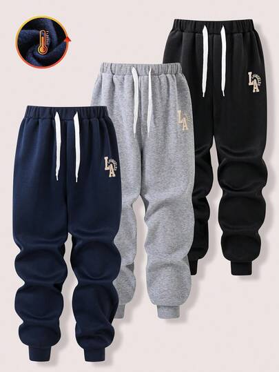 SHEIN Set de 3 pantalones de chándal rectos con cintura con cordón y dobladillo acanalado, estampados, de corte holgado para niños