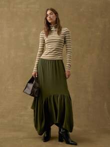 Nöista 高腰不对称长裙，饰有褶裥拼接细节和流畅廓形，配有弹性腰带，穿着舒适；是打造精致日常冬季造型、盛装出席季节性晚宴或优雅新年庆祝活动的理想之选。 - 綠色 - 查看 5