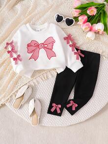 SHEIN Playful Pals 2 件套女婴服装：白色运动衫，带可爱蝴蝶结和格子印花，长袖圆领运动衫和黑色松紧腰打底裤，适合休闲、户外、旅行，6 个月 - 3 岁 - 黑與白 - 查看 1
