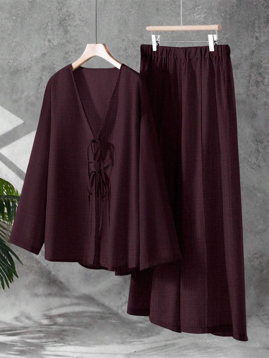 Linhara مجموعة قطعتين للمرأة ذات المقاسات الكبيرة، ملابس علوية لون سادة وبنطلون فضفاض - عنابي اللون - مشاهدة 1