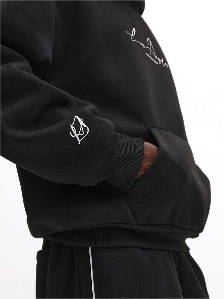 Oversized Hoodie With Cursive Script And Centre Pocket