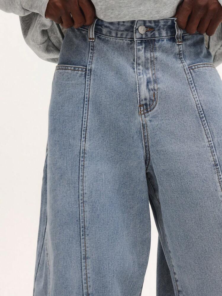 Jeans larghi in denim con gamba larga e pannelli dritti