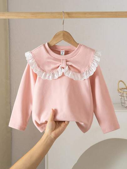 Genkimix Kids 女童可爱蝴蝶结领撞色刺绣荷叶边长袖粉色T恤，适合秋冬季休闲穿着或叠穿。
