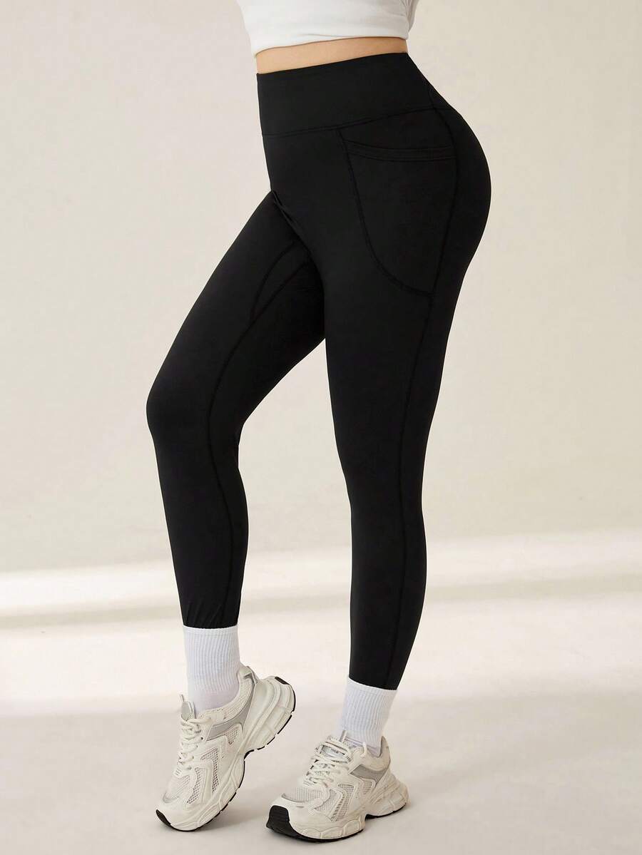Auralis Athleisure Plus Size Women Stitch Sports Leggings With Phone Pocket, Sweatpants, Women's Joggers, Sweatpants For Women, Winter Sportswear For Plus Size Women - Black - View 1