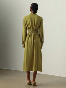 Vesra Vestido de manga larga de unicolor con botón decorativo de metal y dobladillo dividido en la cintura para mujer