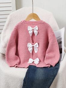 SHEIN 女童秋冬粉色蝴蝶结针织衫，休闲圆领长袖开襟针织蝴蝶结毛衣，秋冬时尚。可爱女孩。日常休闲穿搭。蝴蝶结长袖针织衫。秋季必备单品，秋季上衣，秋季毛衣，百搭，非常适合秋冬季日常休闲穿着和上学穿着。 - 粉色 - 查看 7