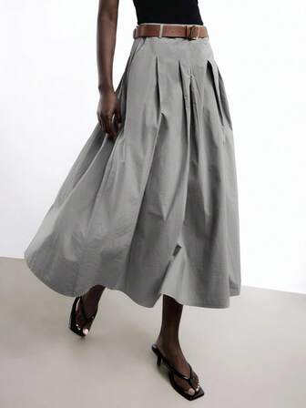 Maija Falda de cuero sintético PU con bolsillos laterales plisados y cinturón de metal, versátil y elegante para fiestas y uso urbano