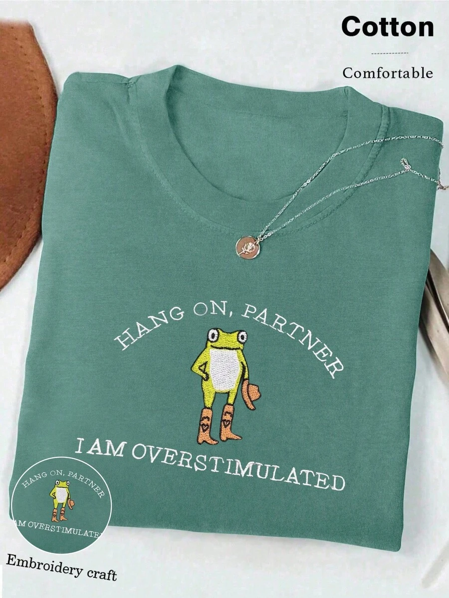 Hold On Partner Embroidered T-Shirt, Cowboy Frog Crazy Shirt, Weird Core Gen Z Graphic Tee For Women - Cadet Blue - View 1