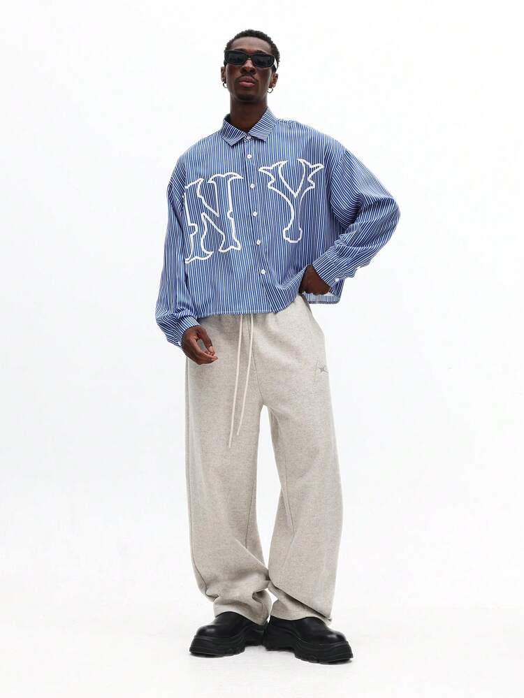 Chemise boutonnée à rayures avec imprimé dessin au trait