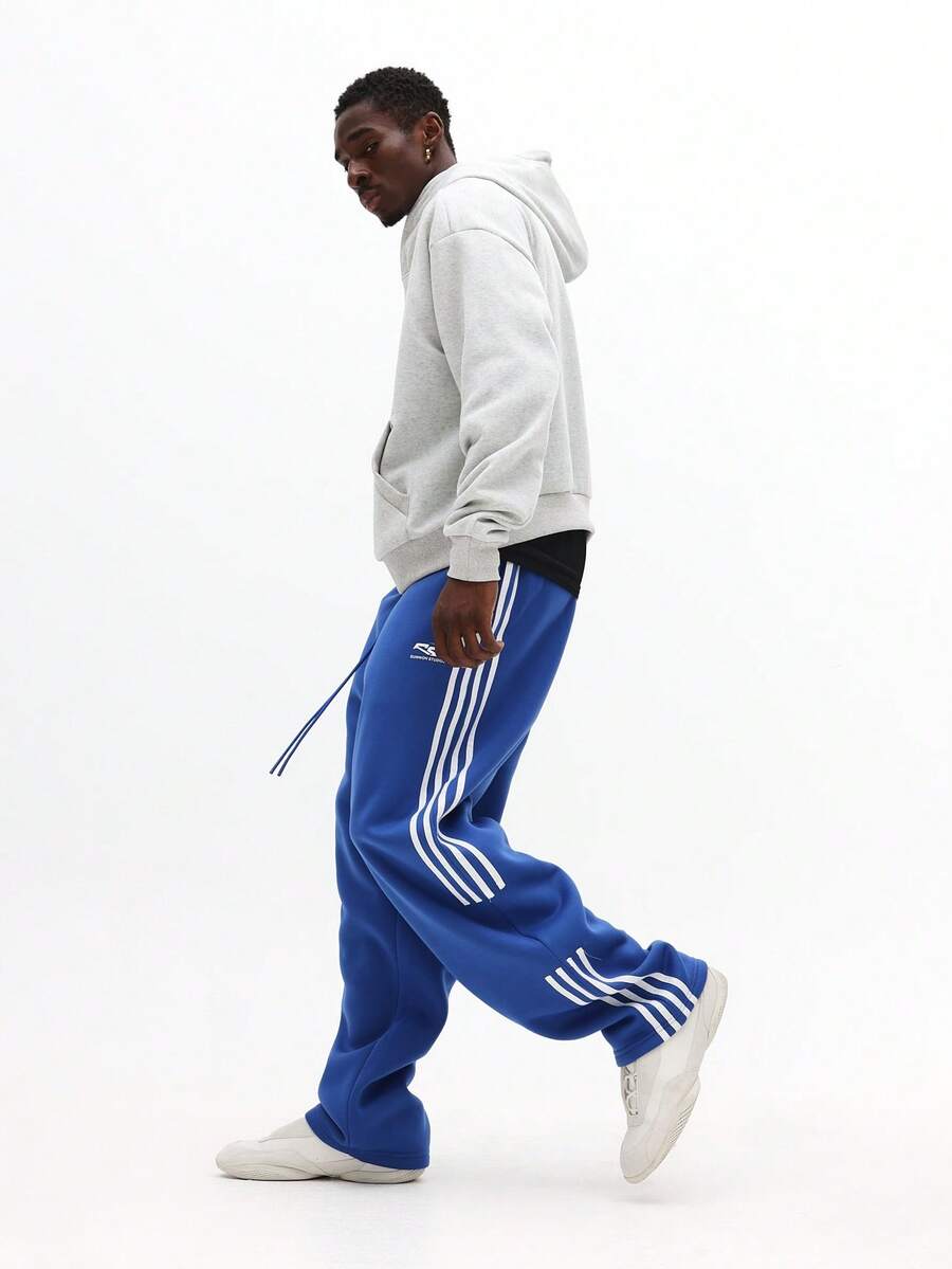 SUMWON 宽松版型运动裤，侧边条纹，休闲居家服，经典街头风，舒适冬季抓绒裤，弹性裤脚，抽绳腰带，舒适运动裤，纯色 - 藍色 - 查看 1