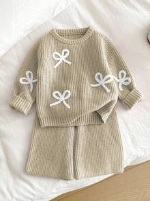 SHEIN Vintaside Kids 新款时尚百搭可爱休闲蝴蝶结针织毛衣套装，适合女宝宝，针织婴儿服，两件套蝴蝶结新生儿套装，秋冬季女宝宝毛衣套装，婴儿服装，秋季针织毛衣，女宝宝服装，女宝宝冬季毛衣，婴儿针织毛衣，针织婴儿套装，秋冬季女宝宝针织套装，女宝宝毛衣两件套，女宝宝冬季服装，两件套针织婴儿保暖套装，两件套针织婴儿套装 - 杏色 - 查看 3