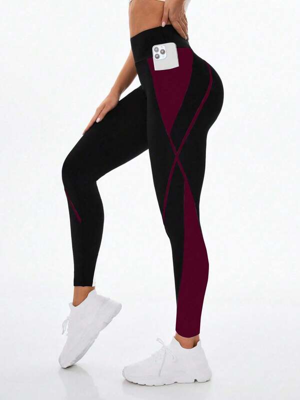 Exploreva Leggings deportivos de cintura alta con bolsillo para teléfono y contraste de color elástico para mujer